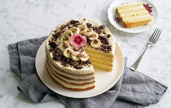 Banana layer cake w/ Vanilla Cream & Dark Chocolate Crumbs